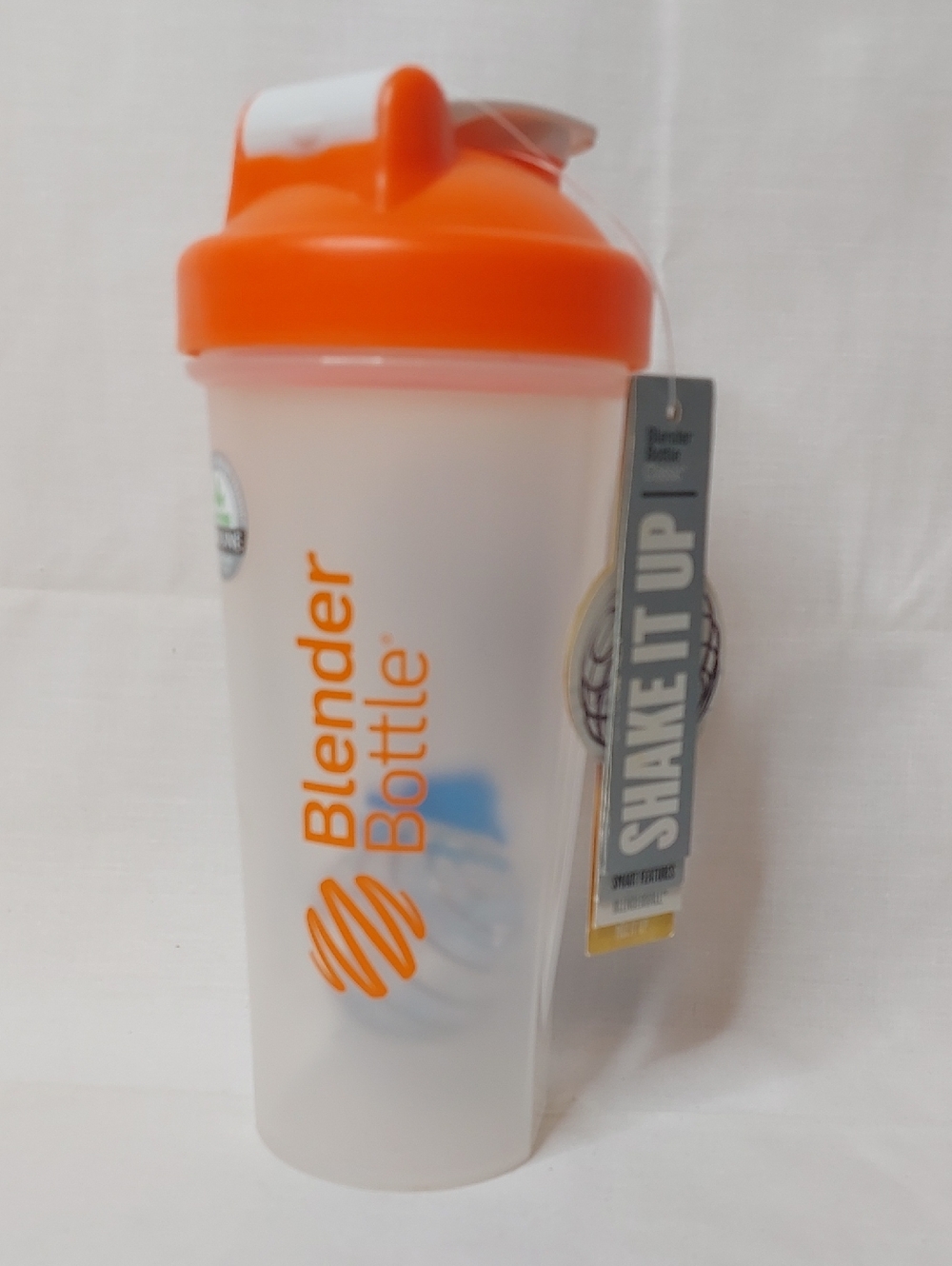 BlenderBottle Classic Shaker in White with Orange Lid